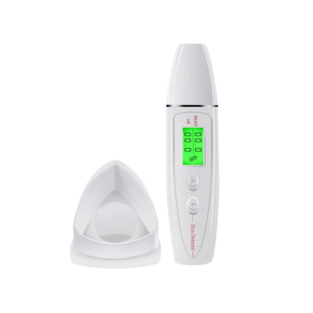 Handheld device with LCD display for testing skin hydration and sebum levels